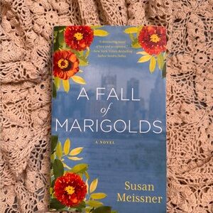 A Fall of Marigolds Paperback Book